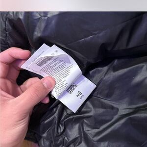 Black Puffer Jacket Miu Miu .